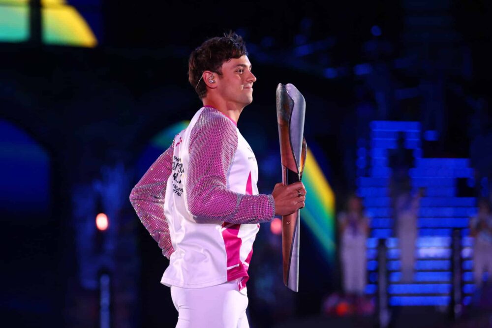 Tom Daley carries the Queen’s Baton during the Opening Ceremony of Commonwealth Games.