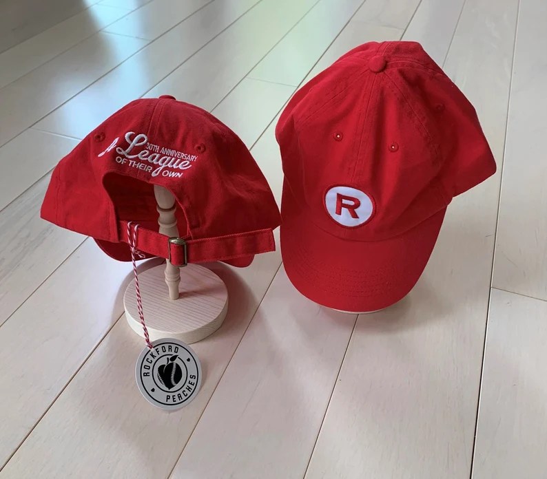 A Rockford Peaches baseball cap.