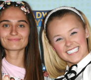 JoJo Siwa smiles for the camera as she stands alongside girlfriend Avery Cyrus