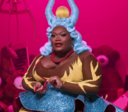 Drag Race star Kornbread Jeté sits during an interview