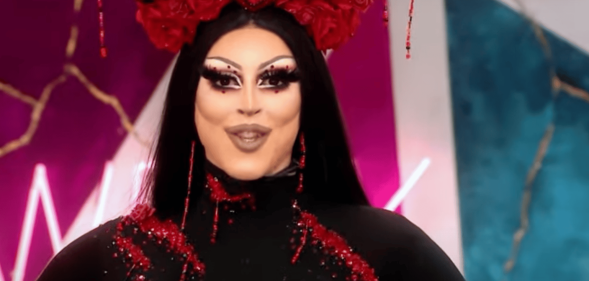 Drag performer Cherry Valentine walks into the werkroom of Drag Race Uk series two