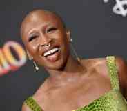 Cynthia Erivo smiling in green dress