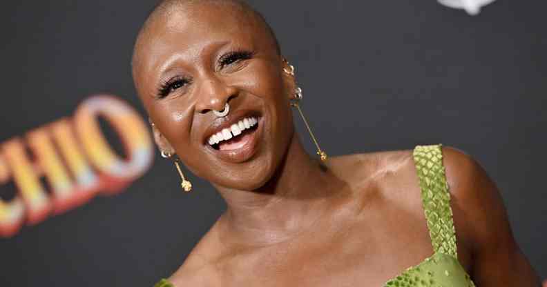 Cynthia Erivo smiling in green dress