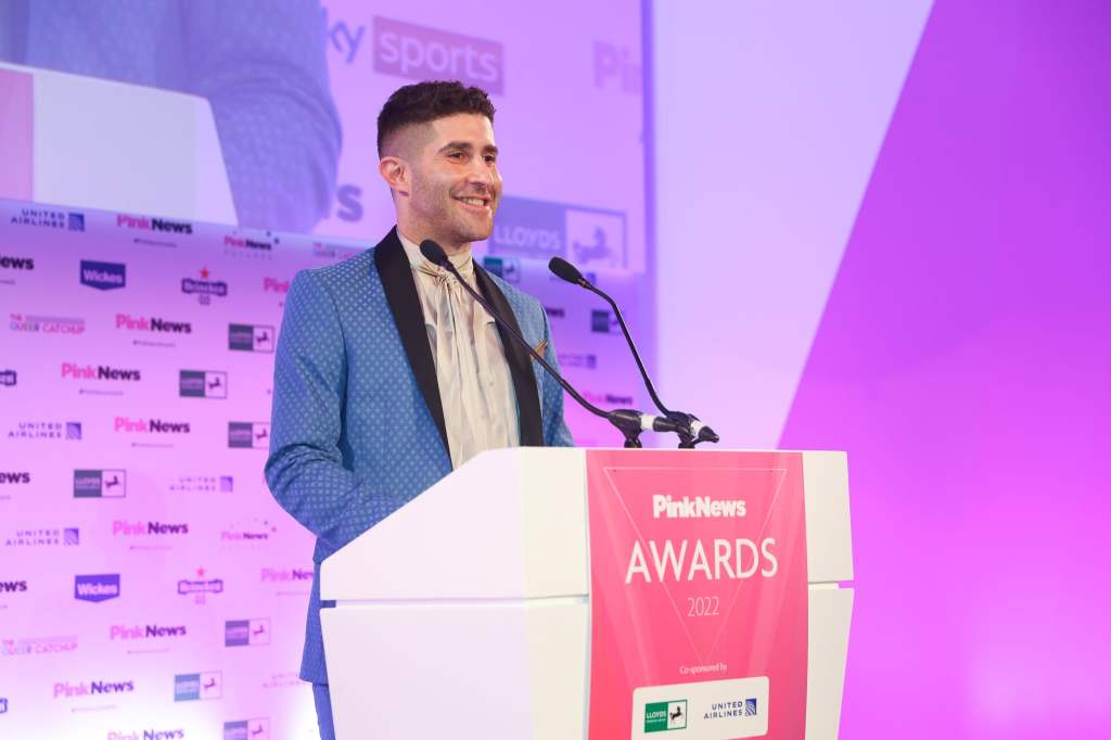 Ben Cohen speaks during the 2022 PinkNews Awards.