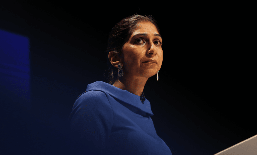 Home secretary Suella Braverman wears a blue outfit as she speaks at the conservative party conference