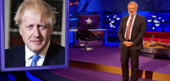 Graham Norton appears next to a picture of Boris Johnson during the opening monologue on his Graham Norton Show commenting on the Tory leadership race