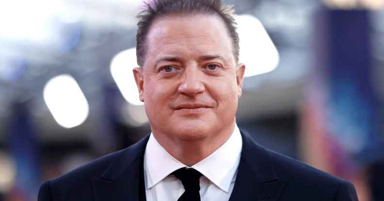 Brendan Fraser wears a suit and tie at an event for The Whale