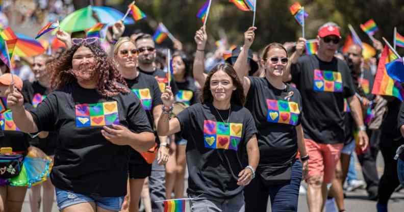 Participants march at the 2022 San Diego Pride Festival And Parade