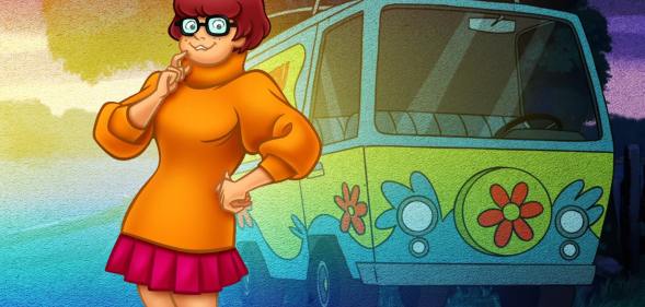 Scooby Doo character Velma stands in front of the Mystery Machine Van. (Warner Bros)