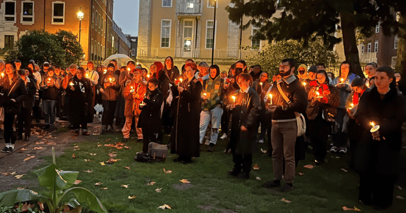 Members of the trans community stand in silent solidarity for those who passed away in 2022