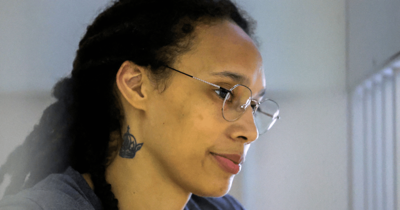 US basketball player Brittney Griner stands in a defendants' cage before a court hearing during her trial on charges of drug smuggling in Russia