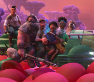 Animated still showing a family of five characters, and a dog, sitting on a green vehicle in a pink alien landscape