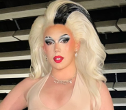 Miss Peaches dressed in a blonde wig and makeup for a Drag event.