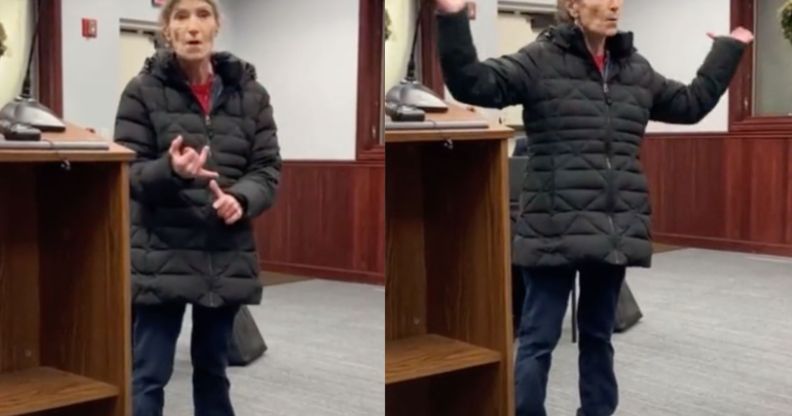 A librarian gestures with her hands as speaks before a board meeting about threats and harassment she's received because conservatives are angry over the library's LGBTQ+ books collections