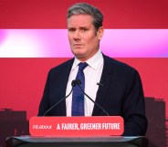 A graphic showing Labour leader Kier Starmer from a political conference with a sign on the podium saying: "A fairer, greener future" and the background
