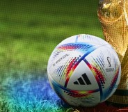 The World Cup trophy and a football with rainbow colours marked over the image in the bottom right-hand corner