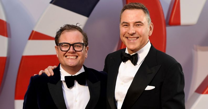 Alan Carr and David Walliams at the premiere of No Time To Die, wearing black suits and bowties.