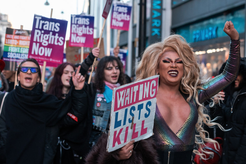 Trans rights activists march through central London after a protest outside Downing Street on 21 January 2023.