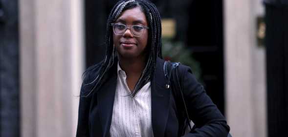 Kemi Badenoch in black coat leaving Downing Street