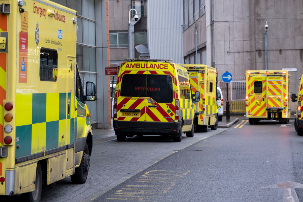 Ambulances from both privately owned companies and the London Ambulance Service waiting in line outside the Royal London Hospital in Whitechapel on 10th January 2023 in London. 