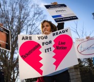 Taylor Swift fans demonstrate outside hearing. (Getty)