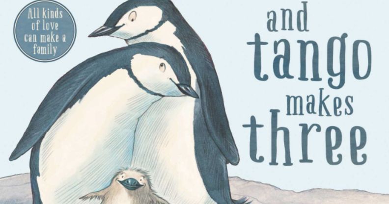 A cover of the book And Tango Makes Three featuring two adult penguins leaning into each other with a baby chick nestled in between them