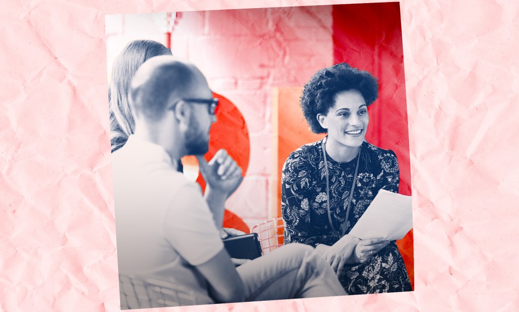 A group of people are talking about work.