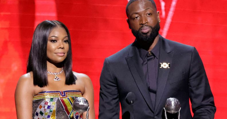 Dwyane Wade and Gabrielle Union accept the President's Award at the NAACP Image Awards.