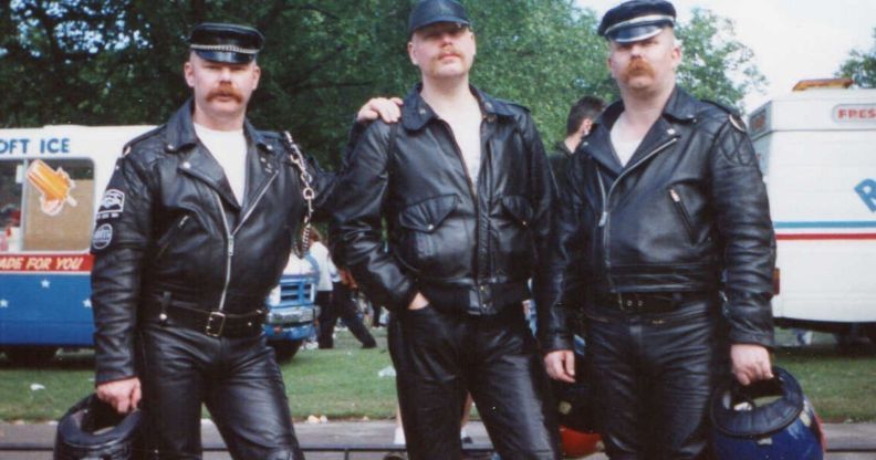 Stuart Conroy (died 20 August 1992), Tomas Jerkestad (died spring 1994), and Steve Craftman, who is still alive today, pictured at a Pride event in 1989. The three men are dressed in leather.