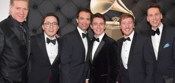 The Kings Singers wearing full black suits complete with black ties at red carpet appearance at the 2019 Grammy Awards.