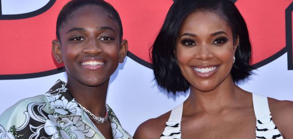 Gabrielle Union stands besides Zaya Wade as they both smile at the Cheaper by the Dozen premiere