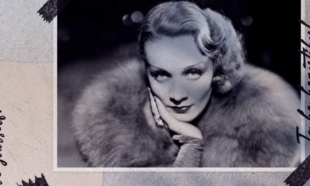 Photo of Marlene wearing a fur coat, wavy hair and a smile