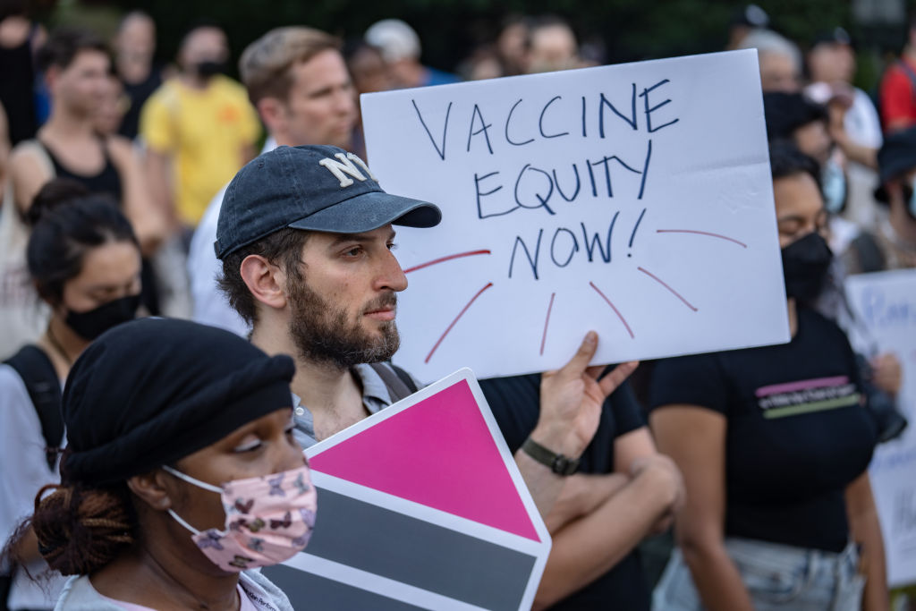 People protest during a rally calling for more government action to combat the spread of monkeypox in New York.