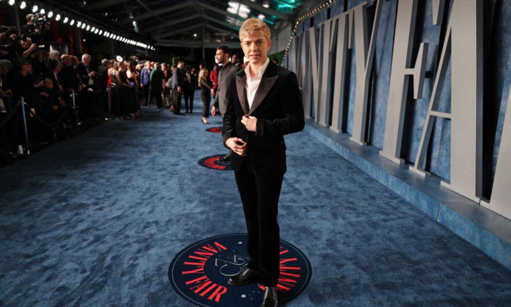 Mae Martin in a tuxedo