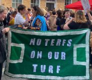 Members of The Dyke Project rally outside of The Lesbian Project meeting point.