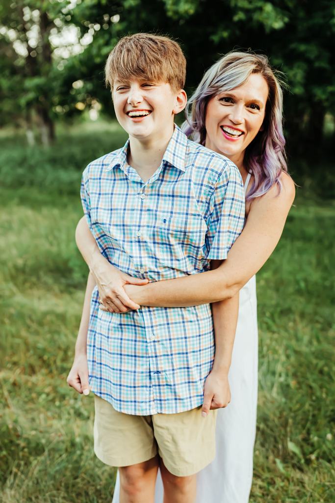 Amber hugging her son