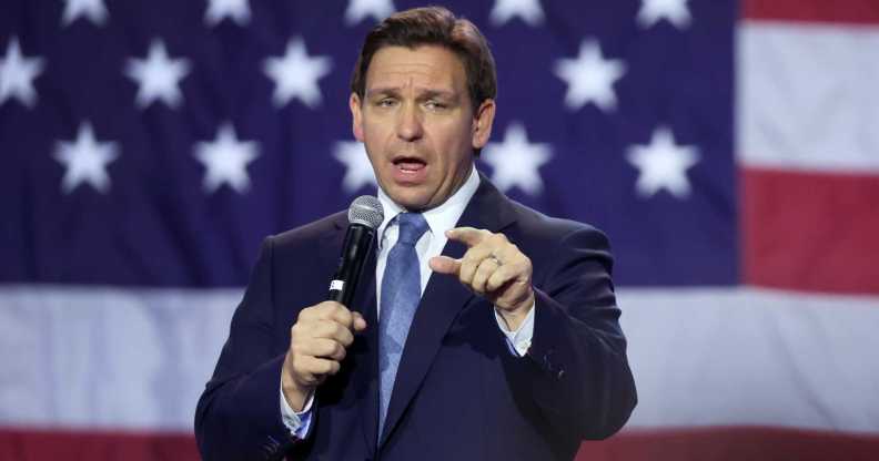 Ron DeSantis in front of a US flag