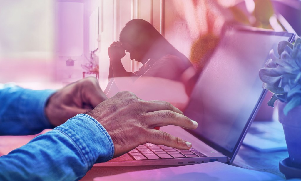 In the foreground, a pair of black hands are typing at a computer. In the background there is a silhouette of a distressed person..