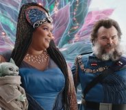 Lizzo (left) with Baby Yoda / Grogu as The Duchess and Jack Black as Captain as Captain Bombadier in The Mandalorian season three episode six "Chapter 22: Guns For Hire"