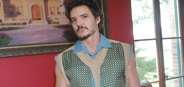 Pedro Pascal wears a spotted green, white and blue vest at the Merge Mansion Mobile Game Event.