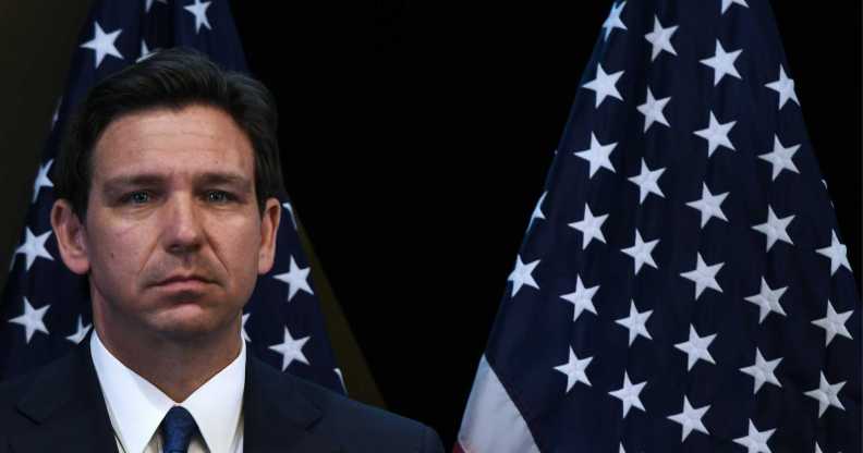 Ron DeSantis in front of United States flags