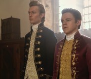 Gay couple Reynolds (Freddie Dennis) and Brimsley (Sam Clemmett) in Queen Charlotte: A Bridgerton Story.