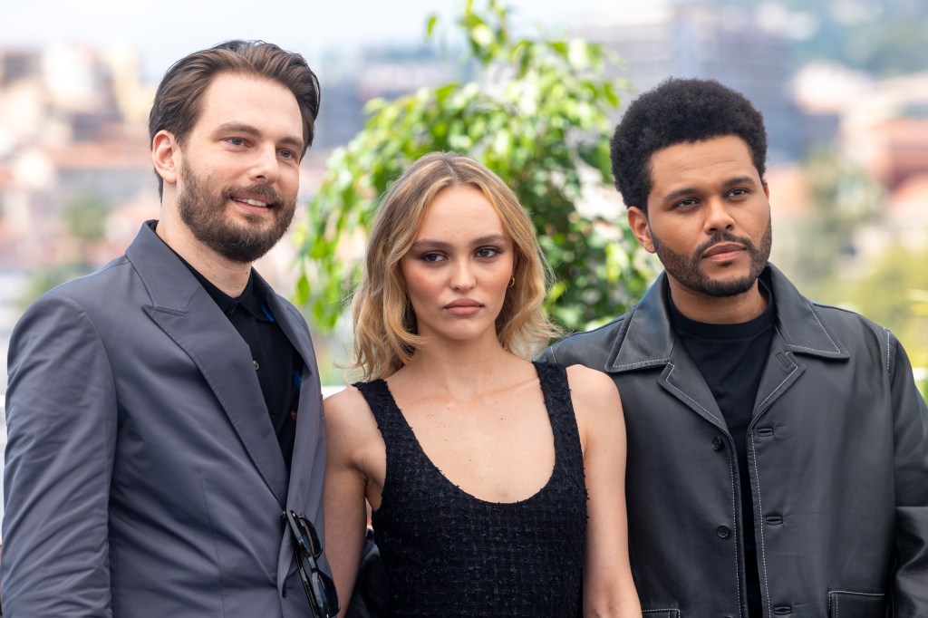 Sam Levinson (L) Lily-Rose Depp and Abel 'The Weeknd' Tesfaye (R) attend at Cannes Film Festival. (Marc Piasecki/FilmMagic)