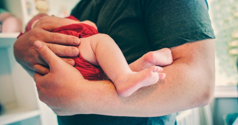 Stock image of a man and baby