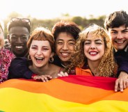 Diverse young friends celebrating gay pride festival - LGBTQ community concept