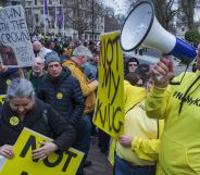 Republic CEO Graham Smith wears a yellow top with the words 'Not my king' on it in protest of King Charles coronation and the monarchy