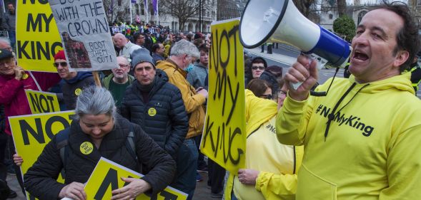 Republic CEO Graham Smith wears a yellow top with the words 'Not my king' on it in protest of King Charles coronation and the monarchy