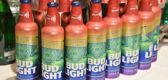 A colection of Pride-themed Bud Light bottles.