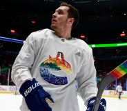 NHL player Bo Horvat of the Vancouver Canucks wears Pride jersey during warm-up in March 2022