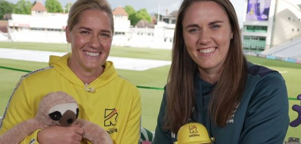 Nat and Katherine Sciver-Brunt pictured in a Cricket stadium holding plush bears.